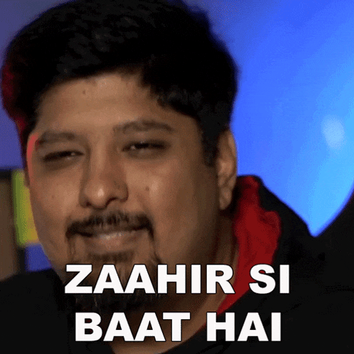 a man with a beard is smiling with the words zaahir si baat hai on his face