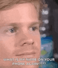 a close up of a man 's face with the words `` what is my name on your phone again ! ''
