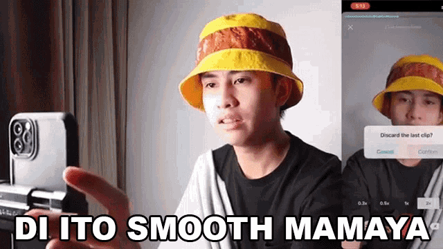 a young man wearing a yellow hat and a black shirt says di ito smooth mamaya