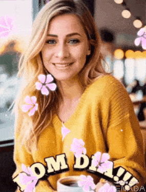 a woman in a yellow sweater is holding a cup of coffee and the words bom dia are surrounded by pink flowers