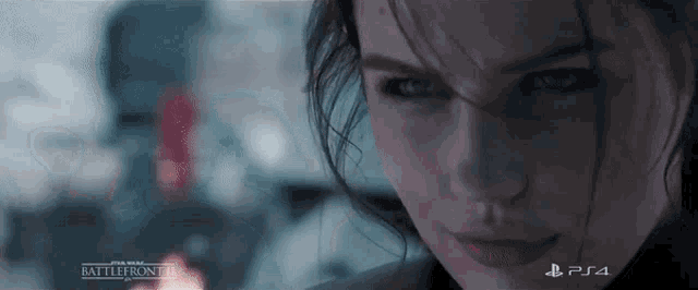 a close up of a woman 's face with a ps4 logo in the corner