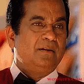Telugu Smiling GIF - Telugu Smiling Shrug GIFs