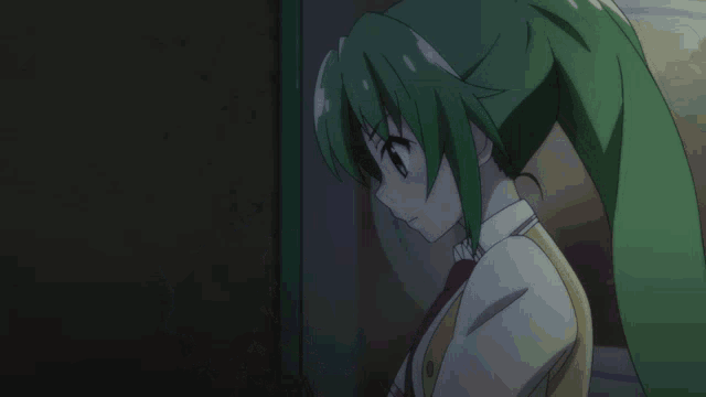 a girl with green hair is holding a doll in her hand