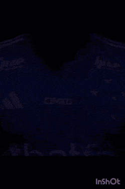 a man wearing a blue shirt that says betfair on it