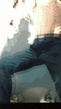 a blurry picture of a person 's face with a shadow of a person behind them