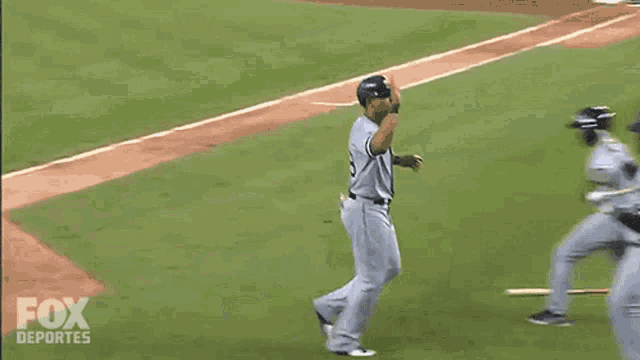 a fox deportes advertisement shows a baseball game being played