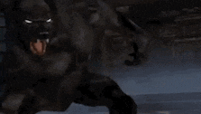 a close up of a werewolf with its mouth open in the dark