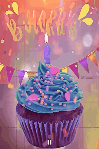 a cupcake with blue frosting and sprinkles has a lit candle on top .