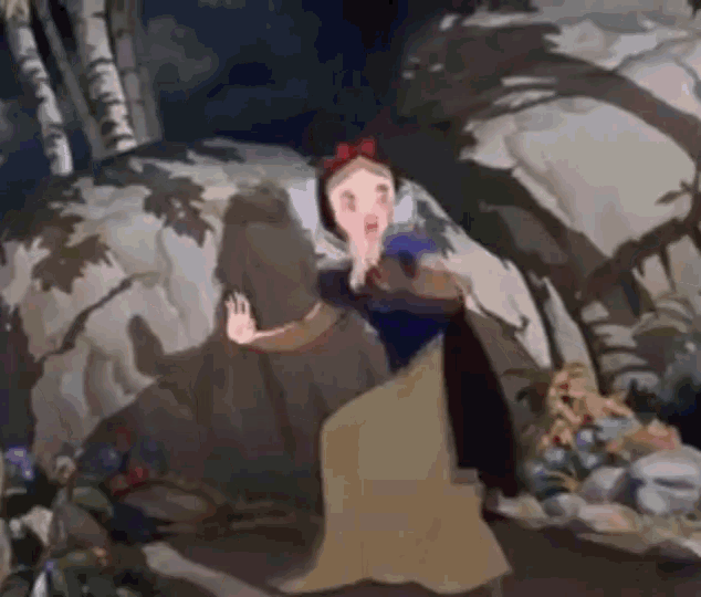 snow white from snow white and the seven dwarfs covering her mouth with her hands