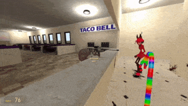 a taco bell sign hangs above a counter