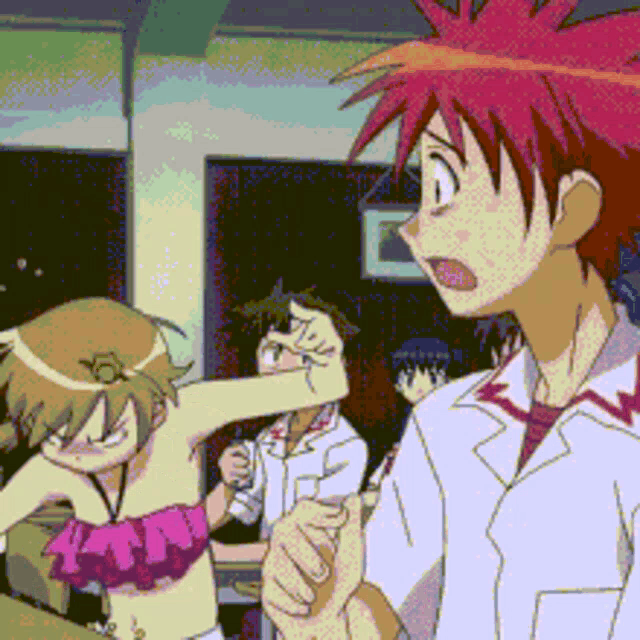 a man with red hair is standing next to a girl