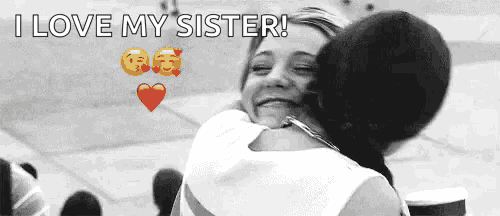 a black and white photo of two women hugging with the words i love my sister