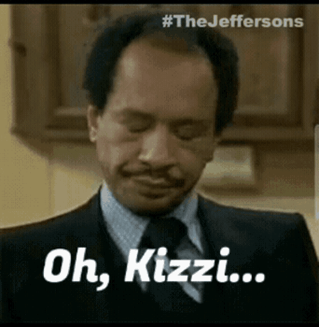 a man in a suit and tie is saying `` oh , kizzi ... ''