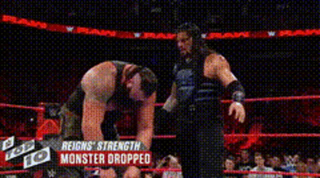 a man in a wrestling ring with the words reigns strength monster dropped