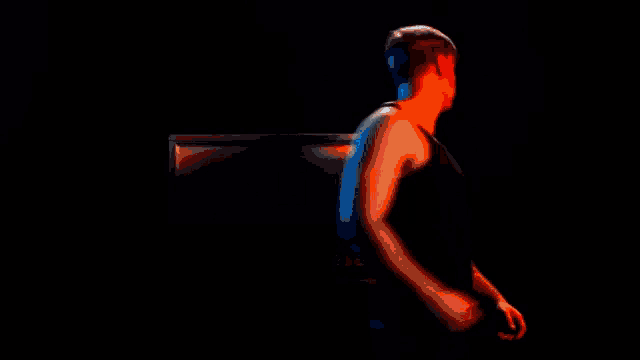 a woman with blue hair is dancing with another woman in a black and white dress