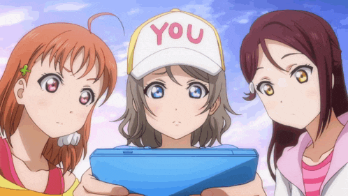 a girl wearing a hat that says you is holding a blue device