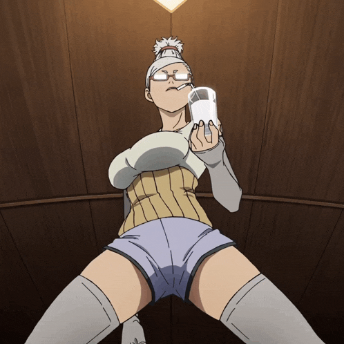 a woman in shorts and knee high socks holds a glass