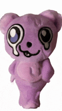 a purple teddy bear with a crying face
