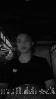 a black and white photo of a person with the words not finish wait