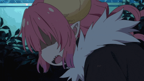 a girl with pink hair and horns is making a face