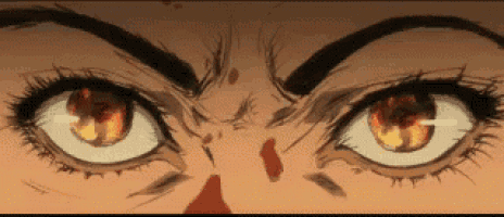 a close up of a person 's eyes with a bloody nose .