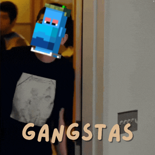 a man in a black shirt is standing in front of a door with the word gangsta written on it