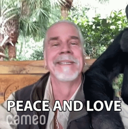 Peace And Love Doc Antle GIF - Peace And Love Doc Antle Cameo GIFs