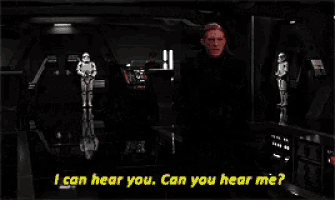 a man says " i can hear you can you hear me " in a dark room