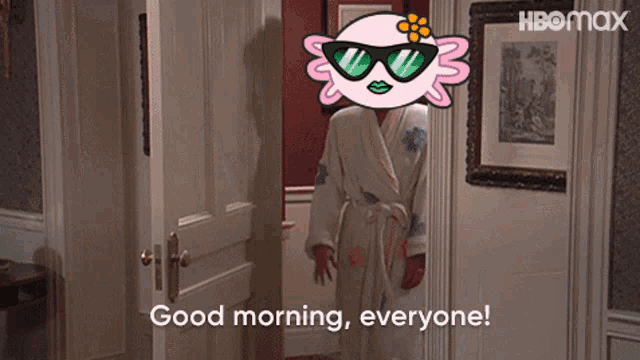 a woman in a bathrobe is standing in a doorway and says good morning everyone
