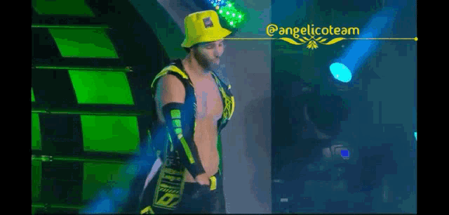 a wrestler wearing a yellow hat and sleeves is walking down a staircase .