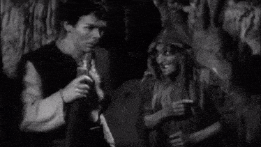 a black and white photo of a man and a woman with the words svi su oni bili u najmu kod mene below them