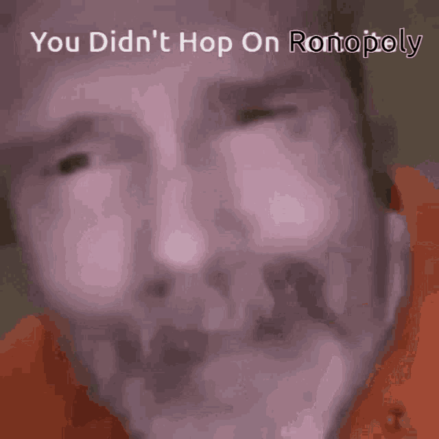 a close up of a man 's face with the words " you did n't hop on monopoly " above it