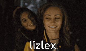 two women are smiling and the word lizlex is on the screen