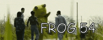 a group of people are walking in front of a frog costume that says frog 54 on it