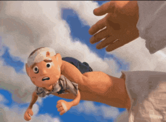 a cartoon character with a bandage on his head is being held by a man 's hand
