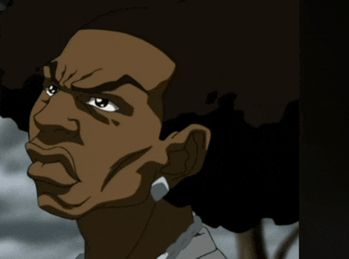 a close up of a man 's face with a serious look on his face