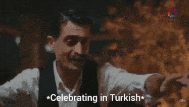 a man in a white shirt and black vest says " celebrating in turkish "
