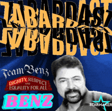 a man with a beard stands in front of a poster that says benz