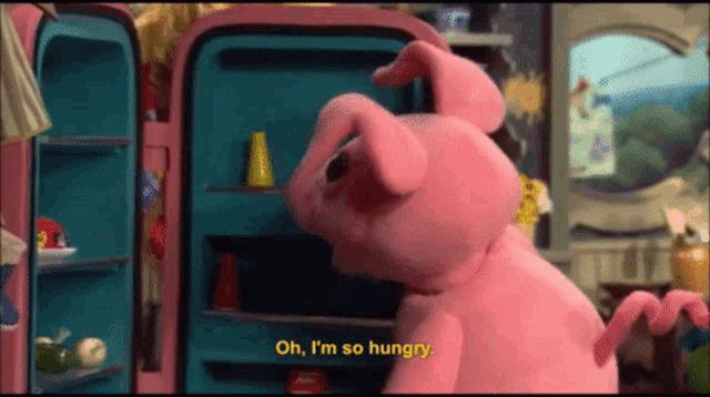 a stuffed pig says oh i 'm so hungry in front of an open refrigerator