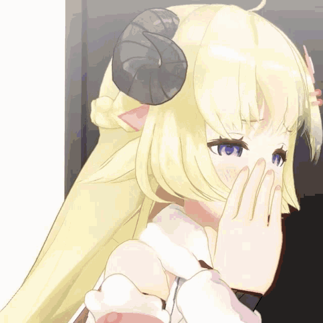 a girl with horns on her head is covering her face
