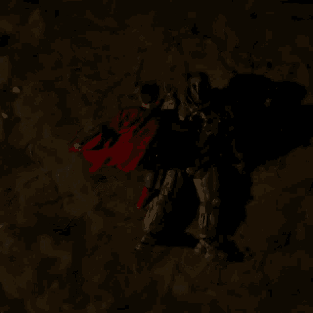 a man in a red cape is laying on the ground with another man