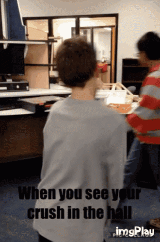 a gif that says ' when you see your crush in the hall ' at the top