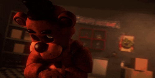 a teddy bear with blue eyes is standing in a room