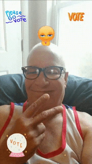 a man wearing glasses and a red white and blue tank top is sitting on a couch