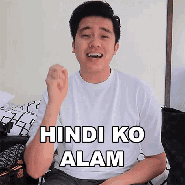 a man wearing a white shirt with the words hindi ko alam on it