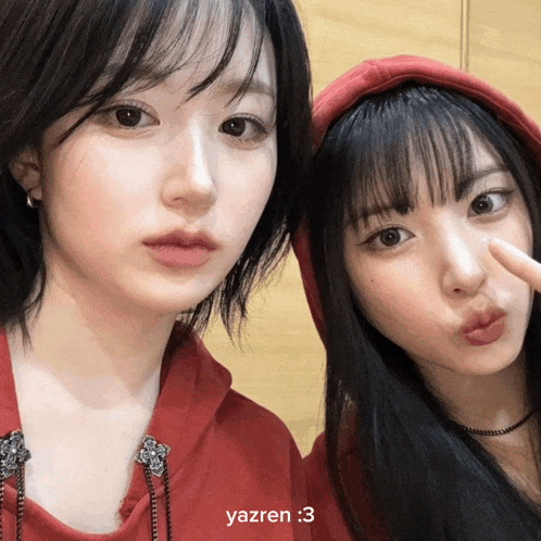 two girls are posing for a picture and the caption says yazren