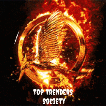 a hunger games logo is surrounded by flames and the words top trenders society