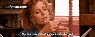 a woman is applying nail polish to her nails and says this is my special nail polish i make it myself .