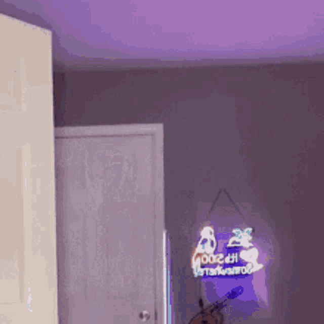 a room with a purple ceiling and a sign that says ' goodbye ' on it