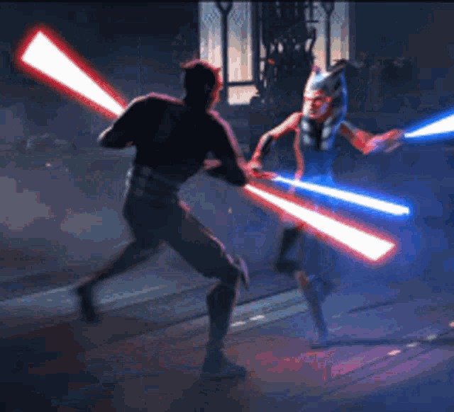two people are fighting with lightsabers in a video game